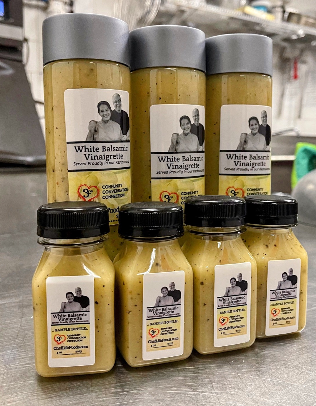 Chef Tony's House White Balsamic Vinaigrette bottles freshly filled in our Rockville kitchen — small-batch production